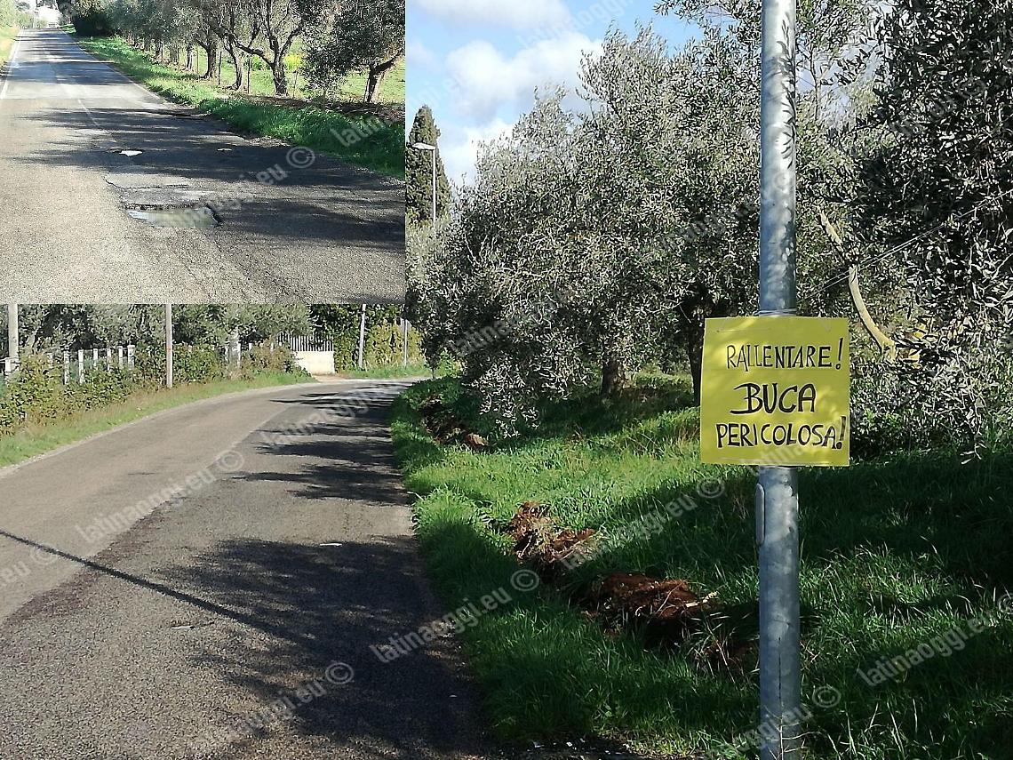 La buca in via Apriliana e l'originale cartello messo dai residenti