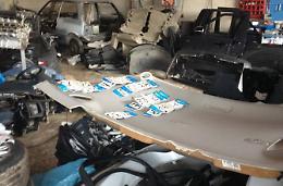 Un'officina specializzata nella ricettazione delle auto di lusso