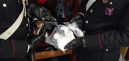 Armi e droga dentro casa: due arresti